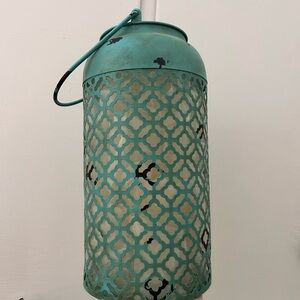 Teal Metal Lantern with Intricate Cutout Design